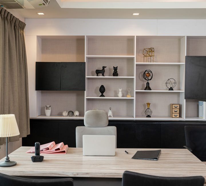 office furniture, with a desk and chair, and wall-mounted dividers